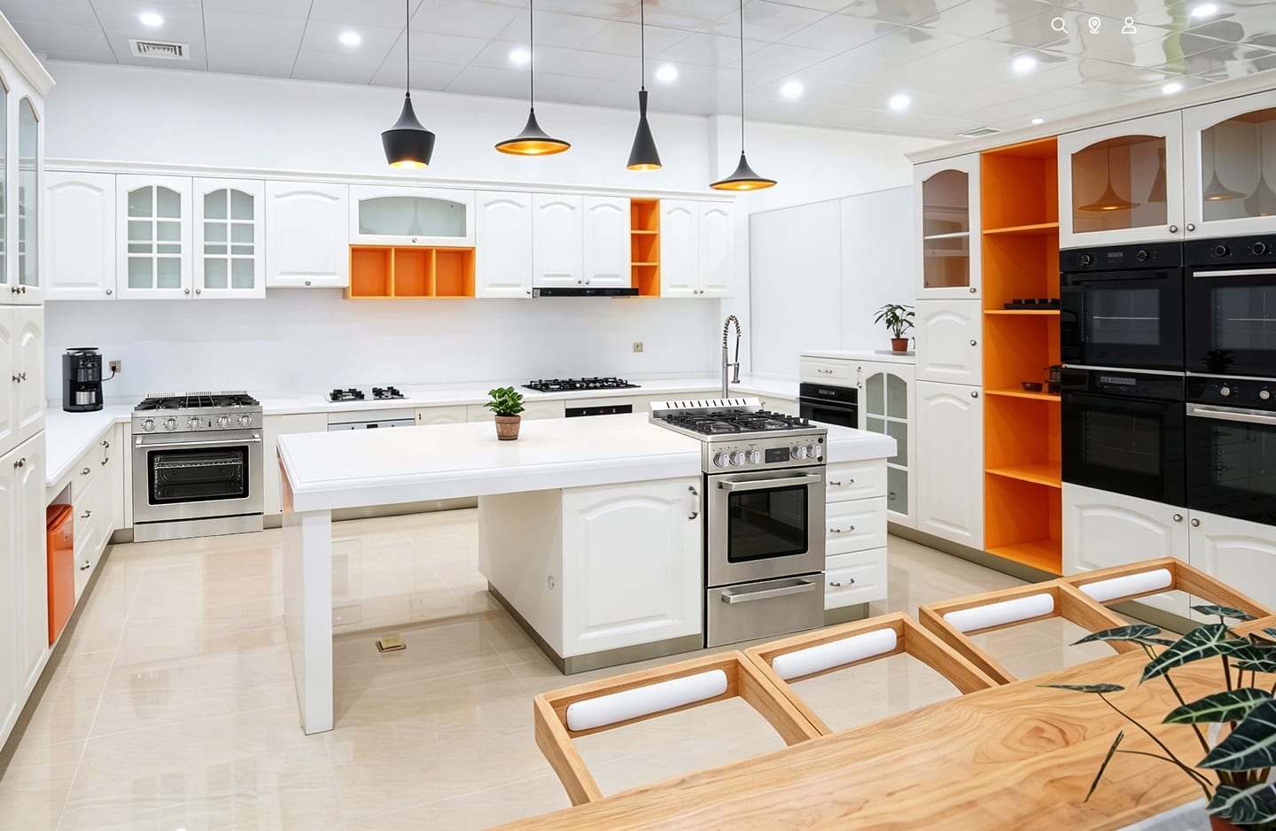 Kitchen appliance showroom with ranges and built-in ovens for dual-base manufacturing page